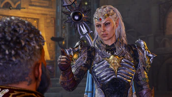 A picture of Jaheira in full battle armour in the basement of the Counting House. The party has just defeated the enemy and after a conversation, Jaheira is reacting with good humor after being the butt of a good joke, yet still somewhat irked at the truth behind it. She comments half seriously, "Bastard."