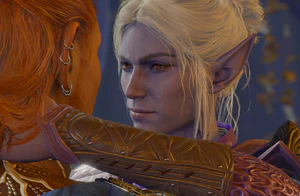 A picture of Minthara as she draws in the player character for a kiss.